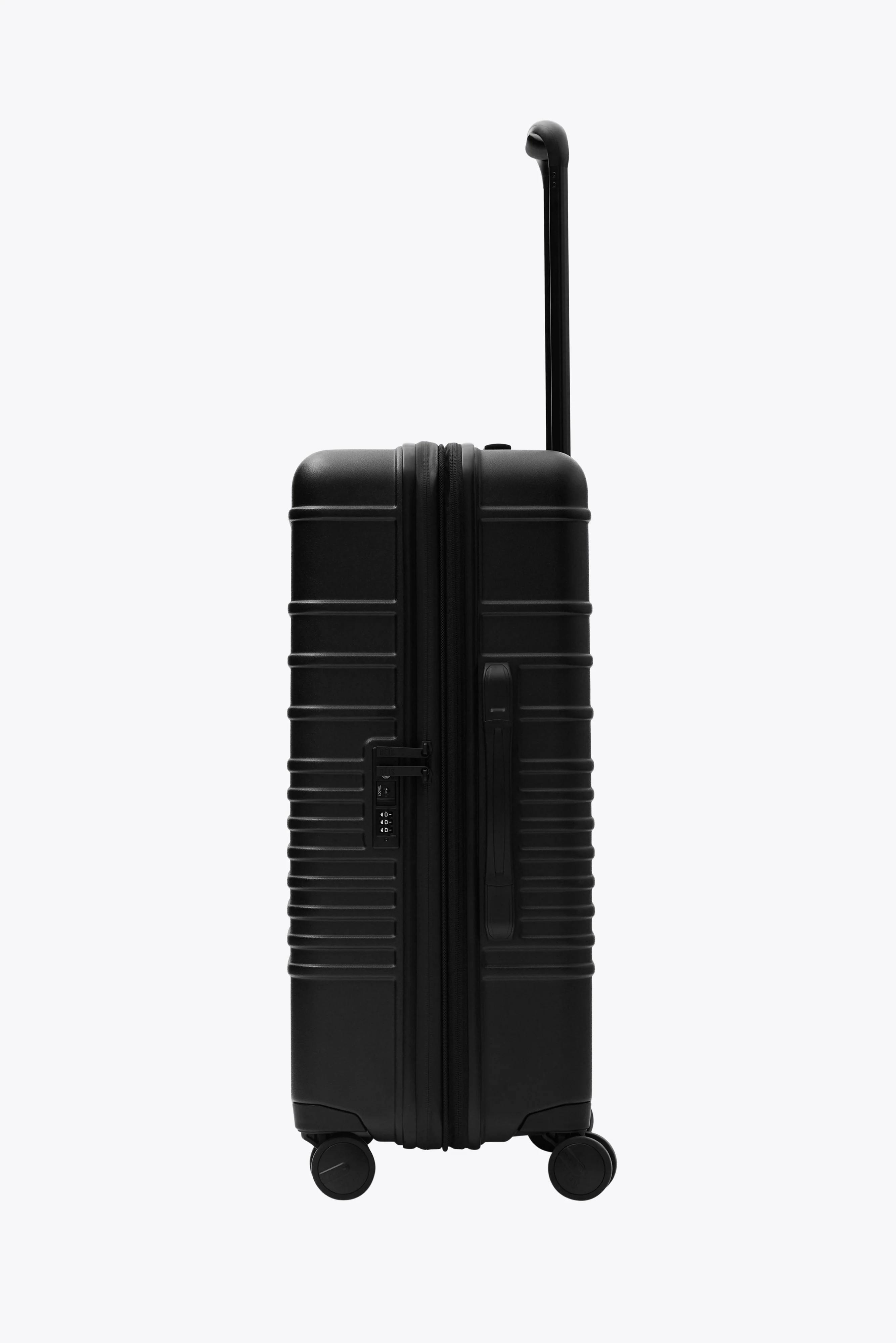 The Medium Check-In Roller in All Black - Image 6
